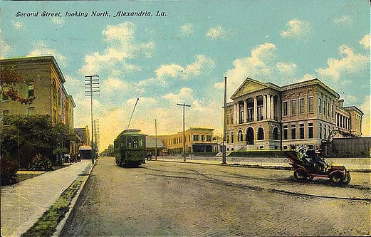 Vintage postcard: Second Street, looking north in Alexandria, Louisiana, with an electric streetcar in front of the Rapides Parish Courthouse